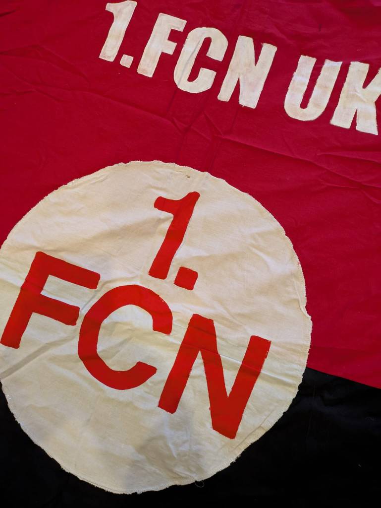 A 1.FCN UK flag, issued by the club